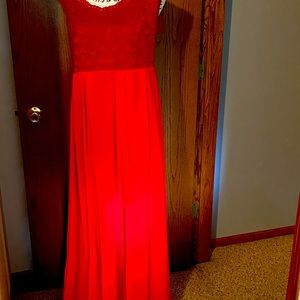 Red long sleeveless dress.  Never worn.  Length=58”.  Size XXL